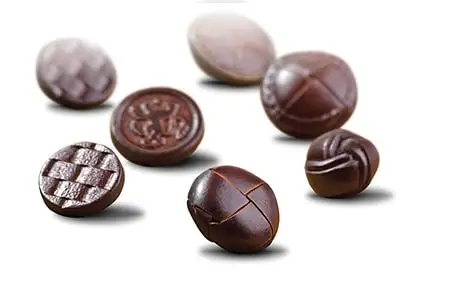 Leather buttons in woven, checked and embossed designs